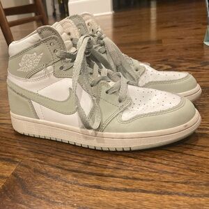 Kids green Nike Jordan’s